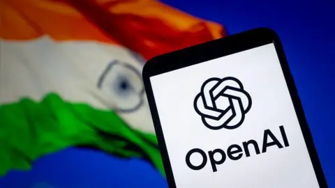 Future Publishing via Getty Images An illustration photo shows OpenAI logo displayed on a smartphone with the flag of India in the background in Chongqing, China on September 1, 2025. 