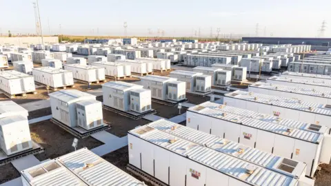 Getty Images A battery energy storage scheme laid out with dozens of container sized units