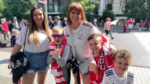 BBC/Will Flockton A family from Crawley outside Wembley Stadium on Sunday