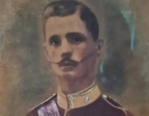 Image supplied A painted portrait showing a man with short dark hair and a moustache in a military uniform.