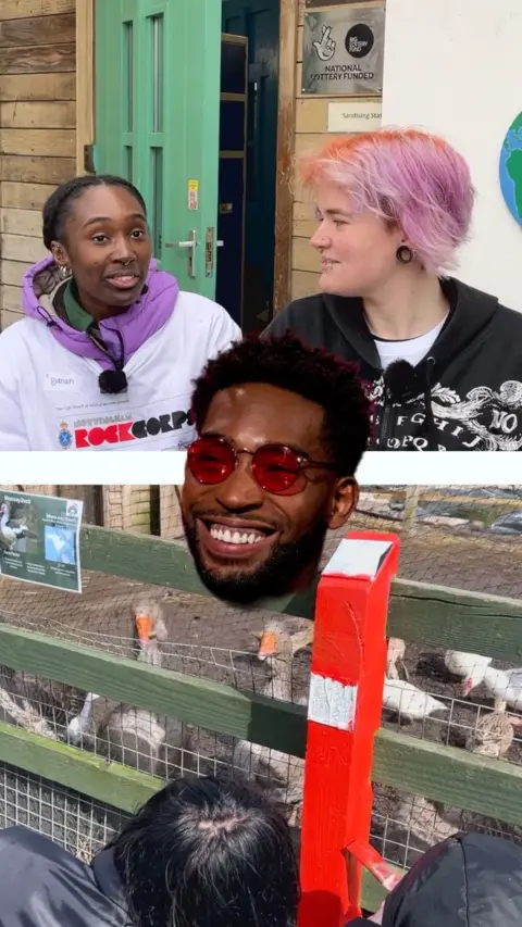 The screen is split into two, with the face of Tinie Tempah (a black man with a short beard, red circular sunglasses and short brown afro hair) in the middle of the screen, smiling. On the top half of the screen, there are two young girls speaking to each other in front of a wooden building, with a green door. The girl on the right is white and has pink hair with black ear gauges and is wearing a black hoodie. The girl on the left is black, and has brown braided hair tied back. She's wearing a white t-shirt which reads 'ROCKCORPS' in all capital letters. 'ROCK' is in red and 'CORPS' is in black. On the bottom half of the screen, two people are facing away from the camera, on the floor painting a red fence. Behind the fence, is a group of white and brown ducks with bright orange beaks. 