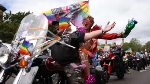 PA Media Motorbikes pass through central London during Pride parade