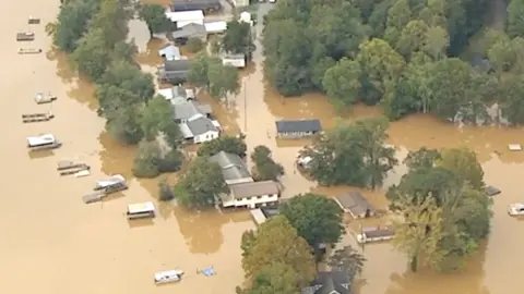 A drone shot of flooded houses in North Carolina