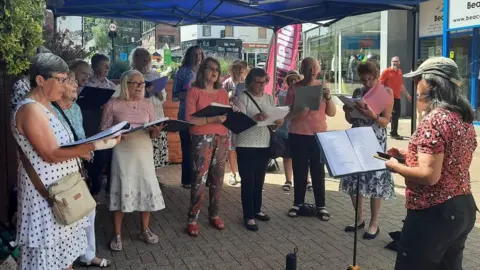 Halesowen BID People singing in a choir