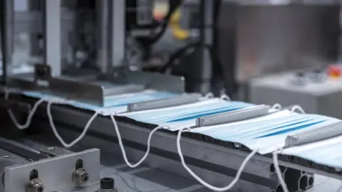 A production line making face masks