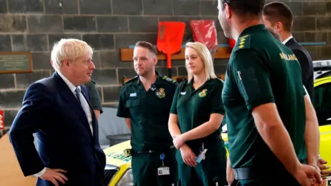 Getty Images The PM with paramedics