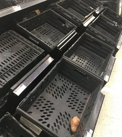 Paul Mitchell/Twitter Shelves low on stock in Rochdale