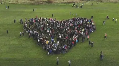 Rimrose Valley Friends protestors make heart shape
