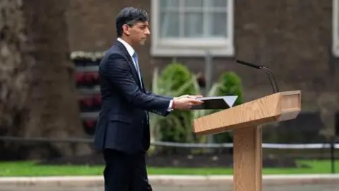 Carl Court/Getty Images) UK Prime Minister Rishi Sunak speaks to the media as he announces the date for the UK General Election in Downing Street