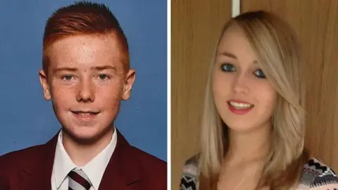 William Brown in a maroon school blazer, white shirt and maroon and grey striped tie. He has ginger hair and freckles and is smiling at the camera. The photo next to him is of Katie Allan who has long, blonde hair. sept to the side. She is wearing a patterned, multi-coloured jumper and is also smiling at the camera.