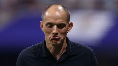 Thomas Tuchel looks dejected after England lose to Argentina