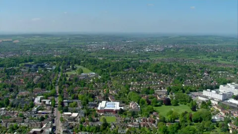 An aerial picture over Oxford, with the John Radcliffe Hospital in the right of the picture.
