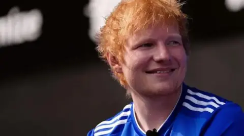 Ed Sheeran smiling.