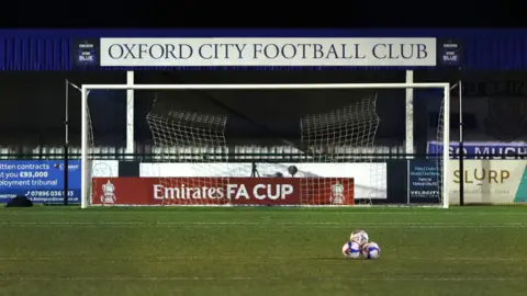 Getty Images A general view prior to the FA Cup First Round match between Oxford City and Northampton Town at Marsh Lane on November 09, 2020 in Oxford, England. Sporting stadiums around the UK remain under strict restrictions due to the Coronavirus Pandemic as Government social distancing laws prohibit fans inside venues resulting in games being played behind closed doors.