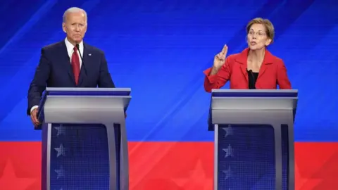 ROBYN BECK/AFP/Getty Images Joe Biden and Elizabeth Warren at the September Democratic debate in Houston