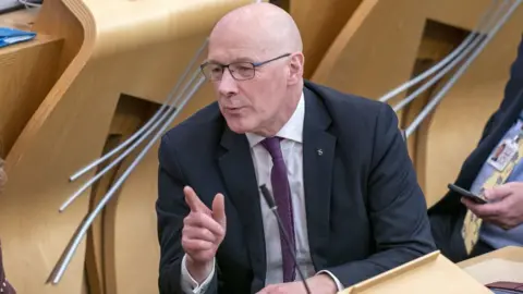 PA Media John Swinney