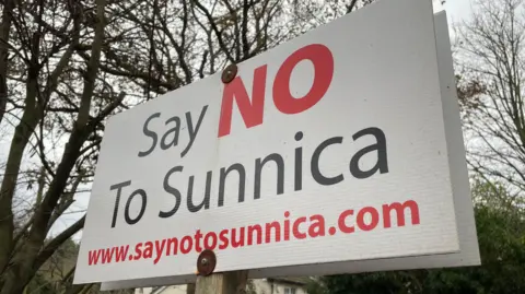 Shaun Whitemore/BBC The Say No to Sunnica group sign. The words are written in black and NO is in red in large capital letters. 