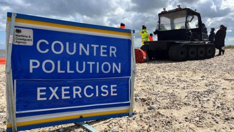 Sign and equipment on beach