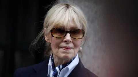 E Jean Carroll outside court
