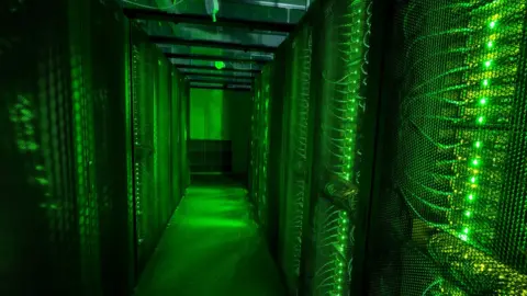 Getty Images Servers for data storage in Hafnarfjordur, Iceland, which is trying to make a name for itself in the business of data centres - warehouses that consume enormous amounts of energy to store the information of 3.2 billion internet users.