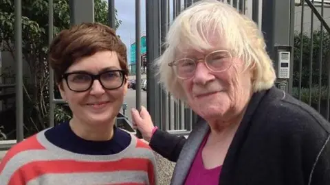 Marie-Louise Kerr pictured with Jennifer Johnston.
Marie-Louise is wearing a striped jumper, while Jennifer is wearing a black coat and pink top.