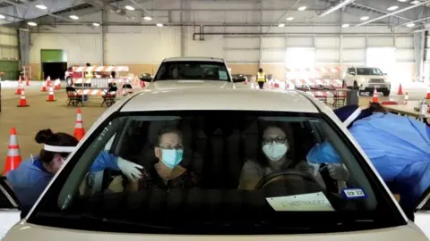 Reuters Drive-through vaccination in Texas