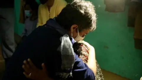 BBC Priyanka Gandhi Vadra with the victim's mother