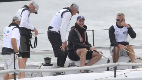 PA Media Prince William and his team