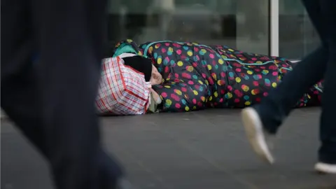 PA Media Homeless man on street