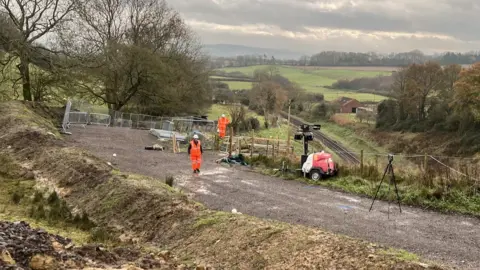 Engineers working at the scene