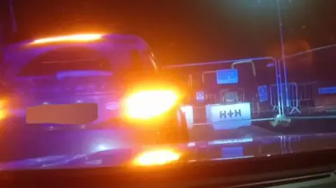 Car dashcam of police pursuit