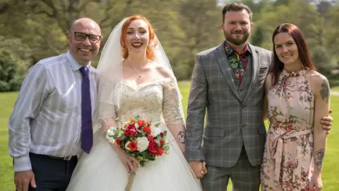 John Scofield Photography Tim Hodgson (far left) and Laura Hugget (far right) at the wedding of Chris Hinchcliffe (middle right)