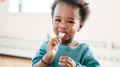 Getty Images Child eating