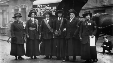 Topical Press Agency 16th November 1912: Suffragettes in Finchley after they have walked from Edinburgh to London to deliver a petition to the prime minister.