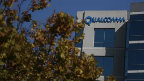 Getty Images A sign is posted at a Qualcomm office on November 1, 2017 in San Jose, California.