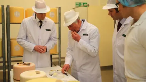 Getty Images Prince of Wales tasting cheese.