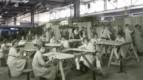 Jet Age Museum collection Workers at HH Martyn, Gloucester, during World War One and the factory as it is now