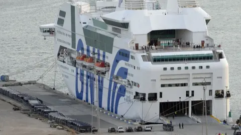 AFP A ship moored in Barcelona to house police reinforcements, 21 September