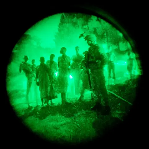 Hugh Kinsella Cunningham Peacekeepers with civilians