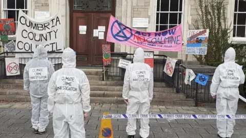 Extinction Rebellion Protestors outside council meeting