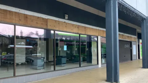 Steve Jones/BBC An empty shop unit at the Headingley Central shopping precinct.