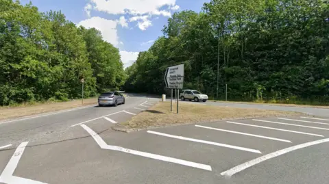 The entrance to a road from a roundabout