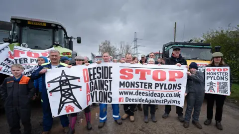 Rob Ferguson FRGS A group of farmers protesting SSEN pylon project 