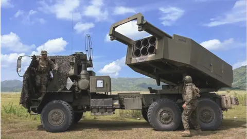 Getty Images Philippines troops with a US-supplied HIMARS launcher