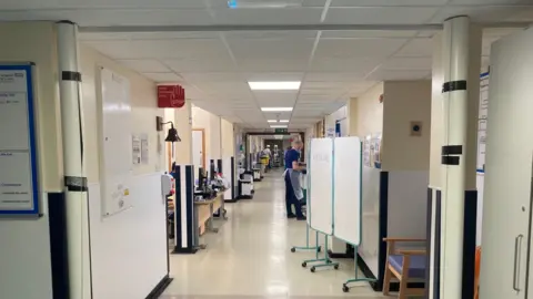 Qays Najm/BBC Roofing props holding up the roof at the hospital