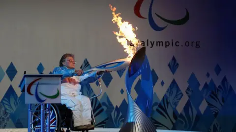 Getty Images Paralympian Caz Walton with Paralympic Heritage Flame