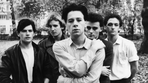 Getty Images Black and white image of Simple Minds taken from a photoshoot in 1980