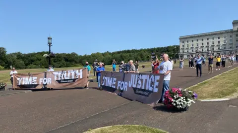 Some victims campaigners and Sinn Féin assembly members gathered at Stormont