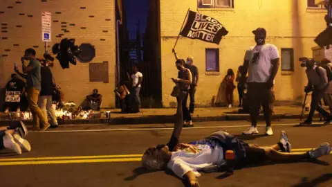 Getty Images Demonstrators gather to protest the death of Daniel Prude