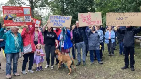 Protestors at Poynton Pool